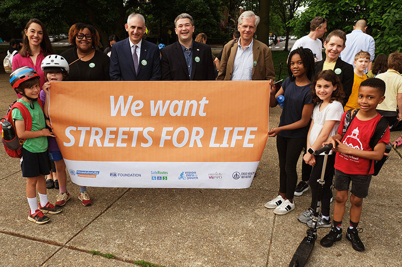 Natalie Draisin, FIA Foundation joins other road safety leaders Nadji Kirby (COMTO), Jason Levine (NHTSA), Rick Birt (DC Highway Safety Office), Jeff Michael (Johns Hopkins) and Nancy Pullen-Seufert (National Center for Safe Routes to School), and children for National Bike &amp; Roll to School Day in Washington, DC.