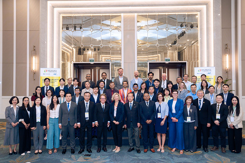 Delegates gathered from Governments, Auto Clubs, NGOs, and helmet experts.